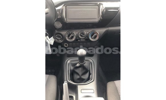 Buy Import Toyota Hilux White Car in Import - Dubai in Barbados Buy Import Toyota Hilux White Car in Import - Dubai in Barbados