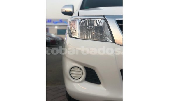 Buy Import Toyota Hilux White Car in Import - Dubai in Barbados Buy Import Toyota Hilux White Car in Import - Dubai in Barbados
