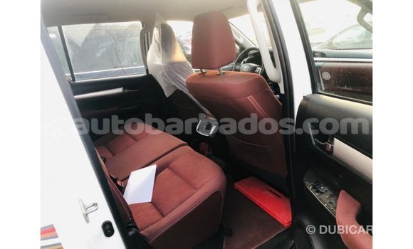 Buy Import Toyota Hilux White Car in Import - Dubai in Barbados Buy Import Toyota Hilux White Car in Import - Dubai in Barbados
