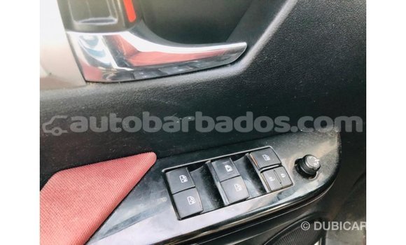 Buy Import Toyota Hilux White Car in Import - Dubai in Barbados Buy Import Toyota Hilux White Car in Import - Dubai in Barbados