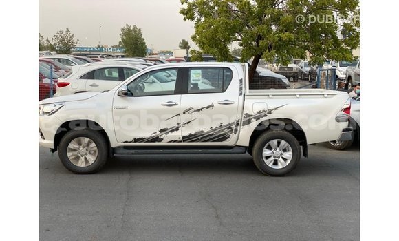 Buy Import Toyota Hilux White Car in Import - Dubai in Barbados Buy Import Toyota Hilux White Car in Import - Dubai in Barbados
