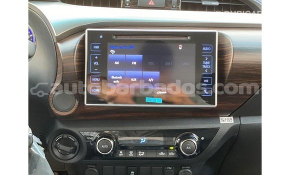 Buy Import Toyota Hilux White Car in Import - Dubai in Barbados Buy Import Toyota Hilux White Car in Import - Dubai in Barbados