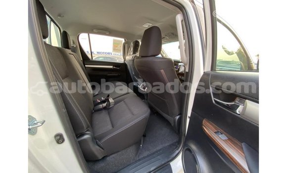 Buy Import Toyota Hilux White Car in Import - Dubai in Barbados Buy Import Toyota Hilux White Car in Import - Dubai in Barbados