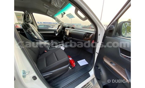 Buy Import Toyota Hilux White Car in Import - Dubai in Barbados Buy Import Toyota Hilux White Car in Import - Dubai in Barbados