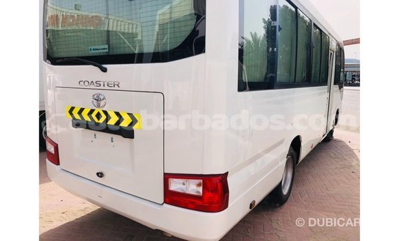 Buy Import Toyota Coaster White Car in Import - Dubai in Barbados Buy Import Toyota Coaster White Car in Import - Dubai in Barbados