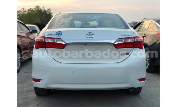 Buy Import Toyota Corolla White Car in Import - Dubai in Barbados Buy Import Toyota Corolla White Car in Import - Dubai in Barbados