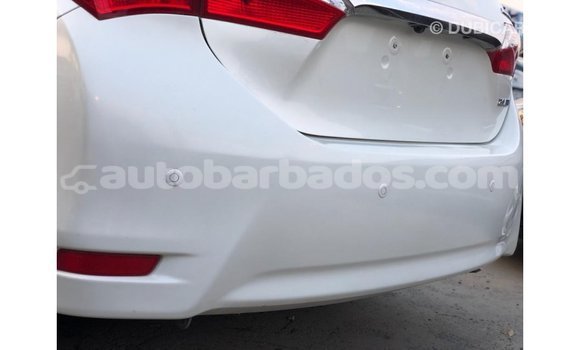 Buy Import Toyota Corolla White Car in Import - Dubai in Barbados Buy Import Toyota Corolla White Car in Import - Dubai in Barbados