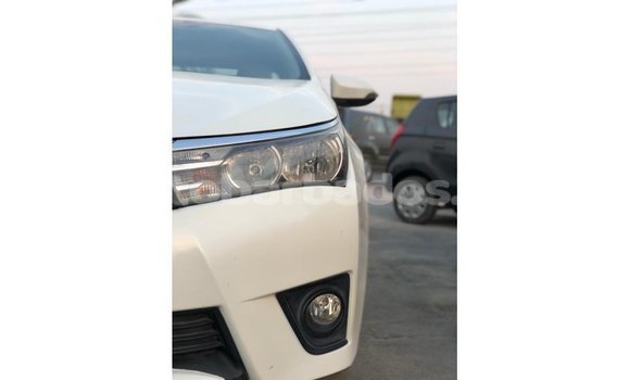 Buy Import Toyota Corolla White Car in Import - Dubai in Barbados Buy Import Toyota Corolla White Car in Import - Dubai in Barbados