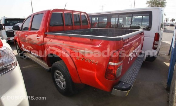 Buy Import Toyota Hilux Red Car in Import - Dubai in Barbados Buy Import Toyota Hilux Red Car in Import - Dubai in Barbados