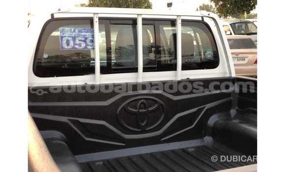 Buy Import Toyota Hilux White Car in Import - Dubai in Barbados Buy Import Toyota Hilux White Car in Import - Dubai in Barbados