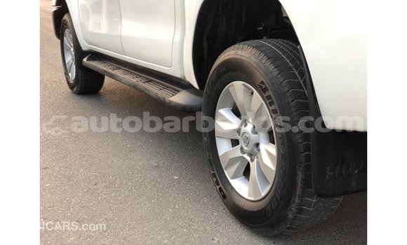 Buy Import Toyota Hilux White Car in Import - Dubai in Barbados Buy Import Toyota Hilux White Car in Import - Dubai in Barbados