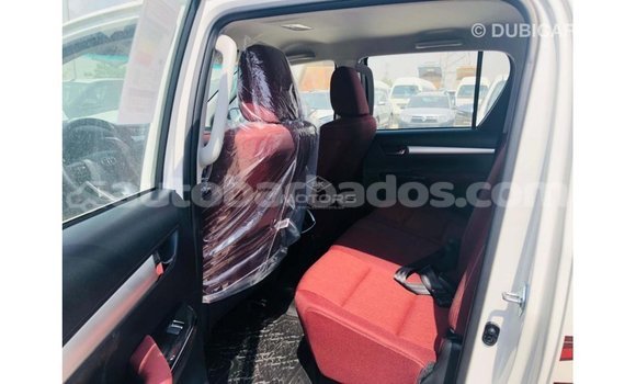 Buy Import Toyota Hilux White Car in Import - Dubai in Barbados Buy Import Toyota Hilux White Car in Import - Dubai in Barbados