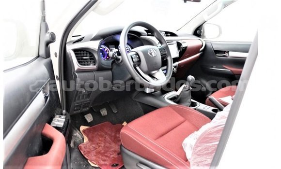Buy Import Toyota Hilux White Car in Import - Dubai in Barbados Buy Import Toyota Hilux White Car in Import - Dubai in Barbados