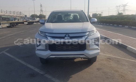 Buy Import Mitsubishi L200 White Car in Import - Dubai in Barbados Buy Import Mitsubishi L200 White Car in Import - Dubai in Barbados