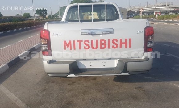 Buy Import Mitsubishi L200 White Car in Import - Dubai in Barbados Buy Import Mitsubishi L200 White Car in Import - Dubai in Barbados