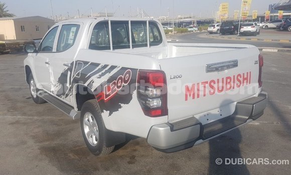 Buy Import Mitsubishi L200 White Car in Import - Dubai in Barbados Buy Import Mitsubishi L200 White Car in Import - Dubai in Barbados