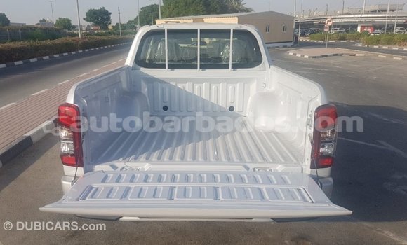 Buy Import Mitsubishi L200 White Car in Import - Dubai in Barbados Buy Import Mitsubishi L200 White Car in Import - Dubai in Barbados