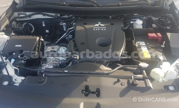 Buy Import Mitsubishi L200 White Car in Import - Dubai in Barbados Buy Import Mitsubishi L200 White Car in Import - Dubai in Barbados