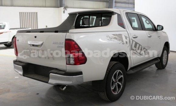 Buy Import Toyota Hilux White Car in Import - Dubai in Barbados Buy Import Toyota Hilux White Car in Import - Dubai in Barbados