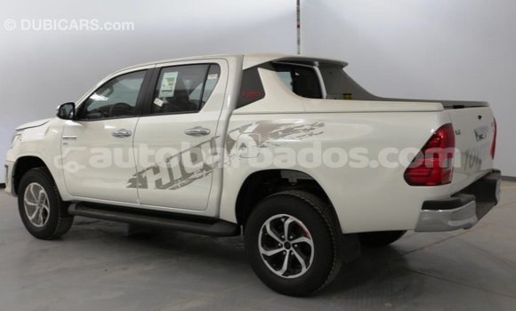 Buy Import Toyota Hilux White Car in Import - Dubai in Barbados Buy Import Toyota Hilux White Car in Import - Dubai in Barbados