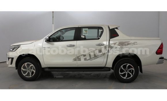 Buy Import Toyota Hilux White Car in Import - Dubai in Barbados Buy Import Toyota Hilux White Car in Import - Dubai in Barbados