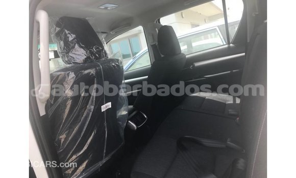 Buy Import Toyota Hilux White Car in Import - Dubai in Barbados Buy Import Toyota Hilux White Car in Import - Dubai in Barbados