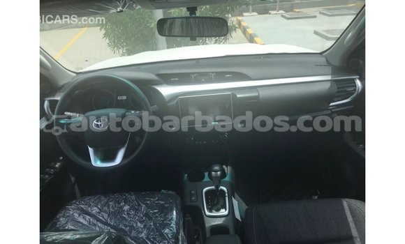 Buy Import Toyota Hilux White Car in Import - Dubai in Barbados Buy Import Toyota Hilux White Car in Import - Dubai in Barbados