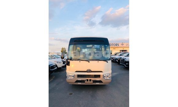 Buy Import Toyota Coaster White Car in Import - Dubai in Barbados