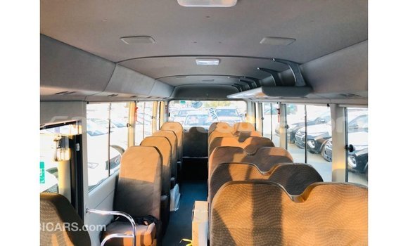 Buy Import Toyota Coaster White Car in Import - Dubai in Barbados Buy Import Toyota Coaster White Car in Import - Dubai in Barbados