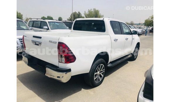 Buy Import Toyota Hilux White Car in Import - Dubai in Barbados Buy Import Toyota Hilux White Car in Import - Dubai in Barbados