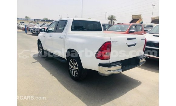 Buy Import Toyota Hilux White Car in Import - Dubai in Barbados Buy Import Toyota Hilux White Car in Import - Dubai in Barbados