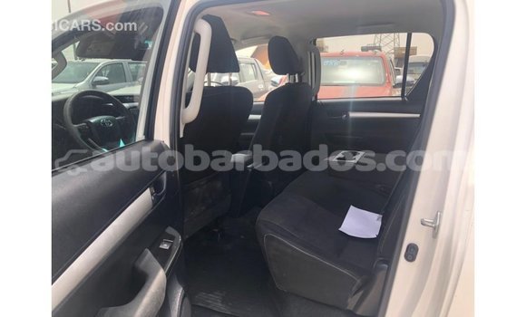 Buy Import Toyota Hilux White Car in Import - Dubai in Barbados Buy Import Toyota Hilux White Car in Import - Dubai in Barbados