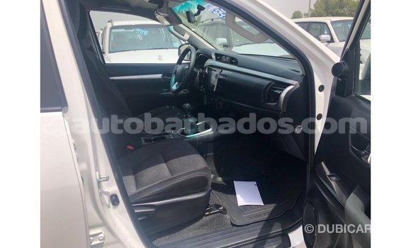 Buy Import Toyota Hilux White Car in Import - Dubai in Barbados Buy Import Toyota Hilux White Car in Import - Dubai in Barbados