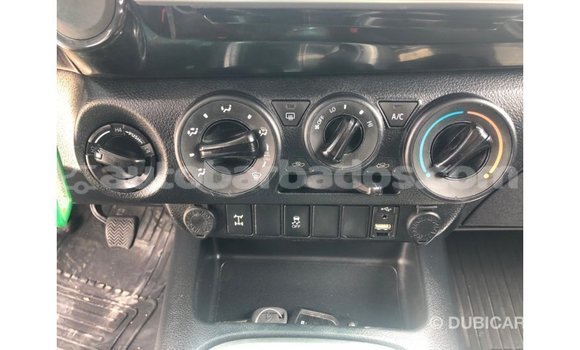 Buy Import Toyota Hilux White Car in Import - Dubai in Barbados Buy Import Toyota Hilux White Car in Import - Dubai in Barbados