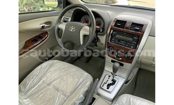 Buy Import Toyota Corolla White Car in Import - Dubai in Barbados Buy Import Toyota Corolla White Car in Import - Dubai in Barbados