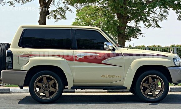 Buy Import Nissan Patrol Beige Car in Import - Dubai in Barbados Buy Import Nissan Patrol Beige Car in Import - Dubai in Barbados