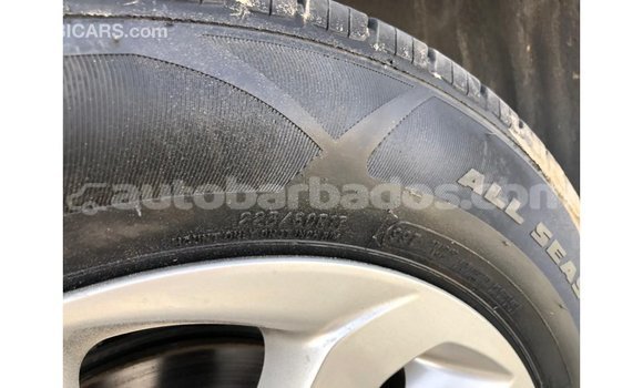 Buy Import Hyundai Tucson Red Car in Import - Dubai in Barbados Buy Import Hyundai Tucson Red Car in Import - Dubai in Barbados