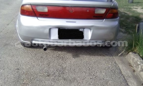 Buy Used Mazda 323 Silver Car in Bridgetown in Barbados Buy Used Mazda 323 Silver Car in Bridgetown in Barbados