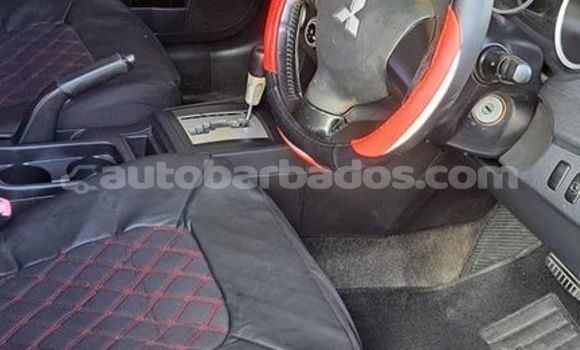 Buy Used Mitsubishi Lancer Black Car in Greenland in Barbados Buy Used Mitsubishi Lancer Black Car in Greenland in Barbados