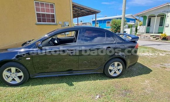 Buy Used Mitsubishi Lancer Black Car in Greenland in Barbados Buy Used Mitsubishi Lancer Black Car in Greenland in Barbados