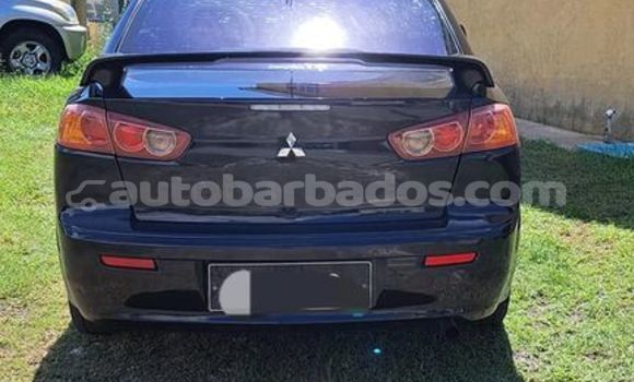 Buy Used Mitsubishi Lancer Black Car in Greenland in Barbados Buy Used Mitsubishi Lancer Black Car in Greenland in Barbados