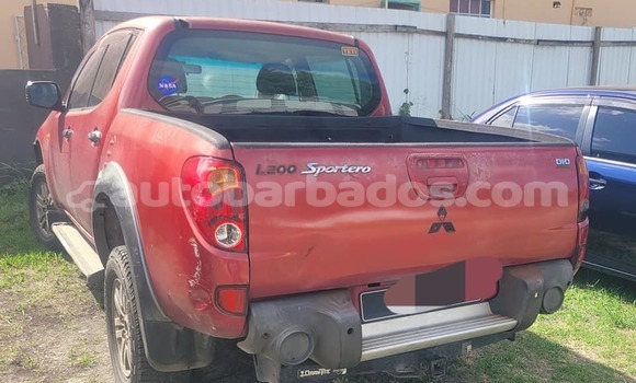 Buy Used Mitsubishi L200 Red Car in Blackmans in Barbados Buy Used Mitsubishi L200 Red Car in Blackmans in Barbados