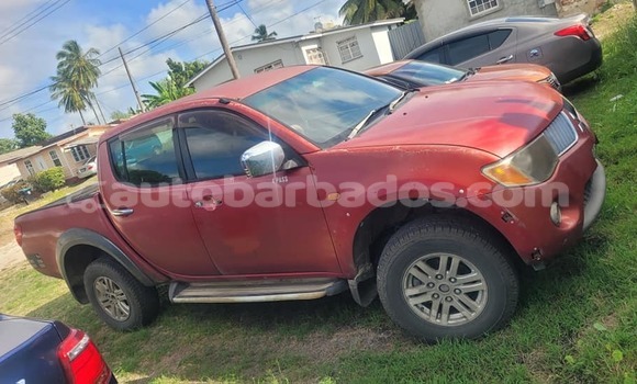 Buy Used Mitsubishi L200 Red Car in Blackmans in Barbados Buy Used Mitsubishi L200 Red Car in Blackmans in Barbados