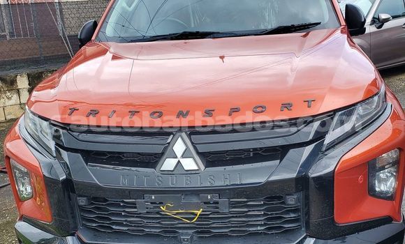 Buy Used Mitsubishi Triton Red Car in Bridgetown in Barbados Buy Used Mitsubishi Triton Red Car in Bridgetown in Barbados