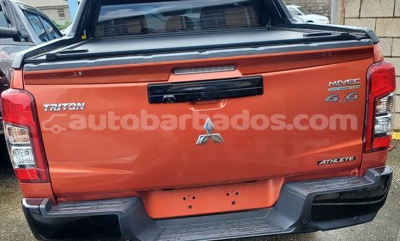Buy Used Mitsubishi Triton Red Car in Bridgetown in Barbados Buy Used Mitsubishi Triton Red Car in Bridgetown in Barbados