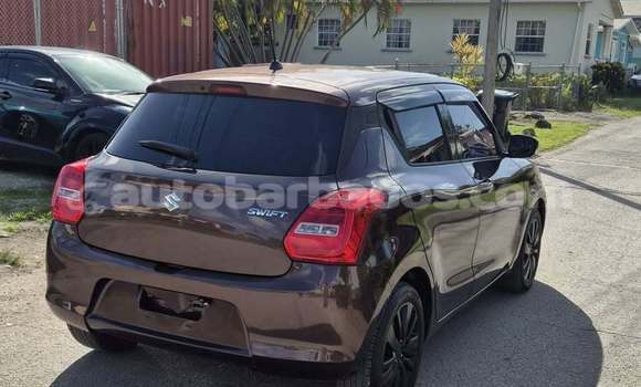 Buy Used Suzuki Swift Red Car in Bridgetown in Barbados Buy Used Suzuki Swift Red Car in Bridgetown in Barbados