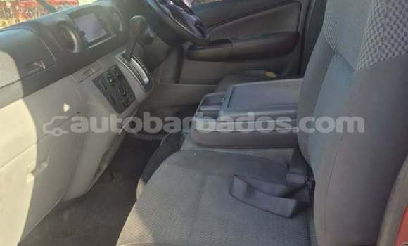Buy Used Nissan NV350 Caravan Red Car in Crane in Barbados Buy Used Nissan NV350 Caravan Red Car in Crane in Barbados