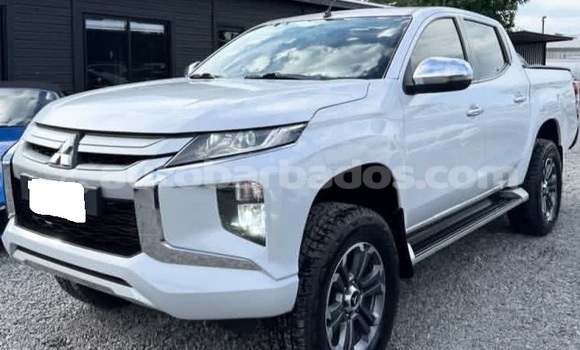 Buy Used Mitsubishi L200 White Car in Bridgetown in Barbados Buy Used Mitsubishi L200 White Car in Bridgetown in Barbados