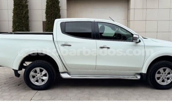 Buy Used Mitsubishi L200 White Car in Bridgetown in Barbados Buy Used Mitsubishi L200 White Car in Bridgetown in Barbados