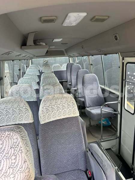 Big with watermark toyota coaster barbados greenland 5054